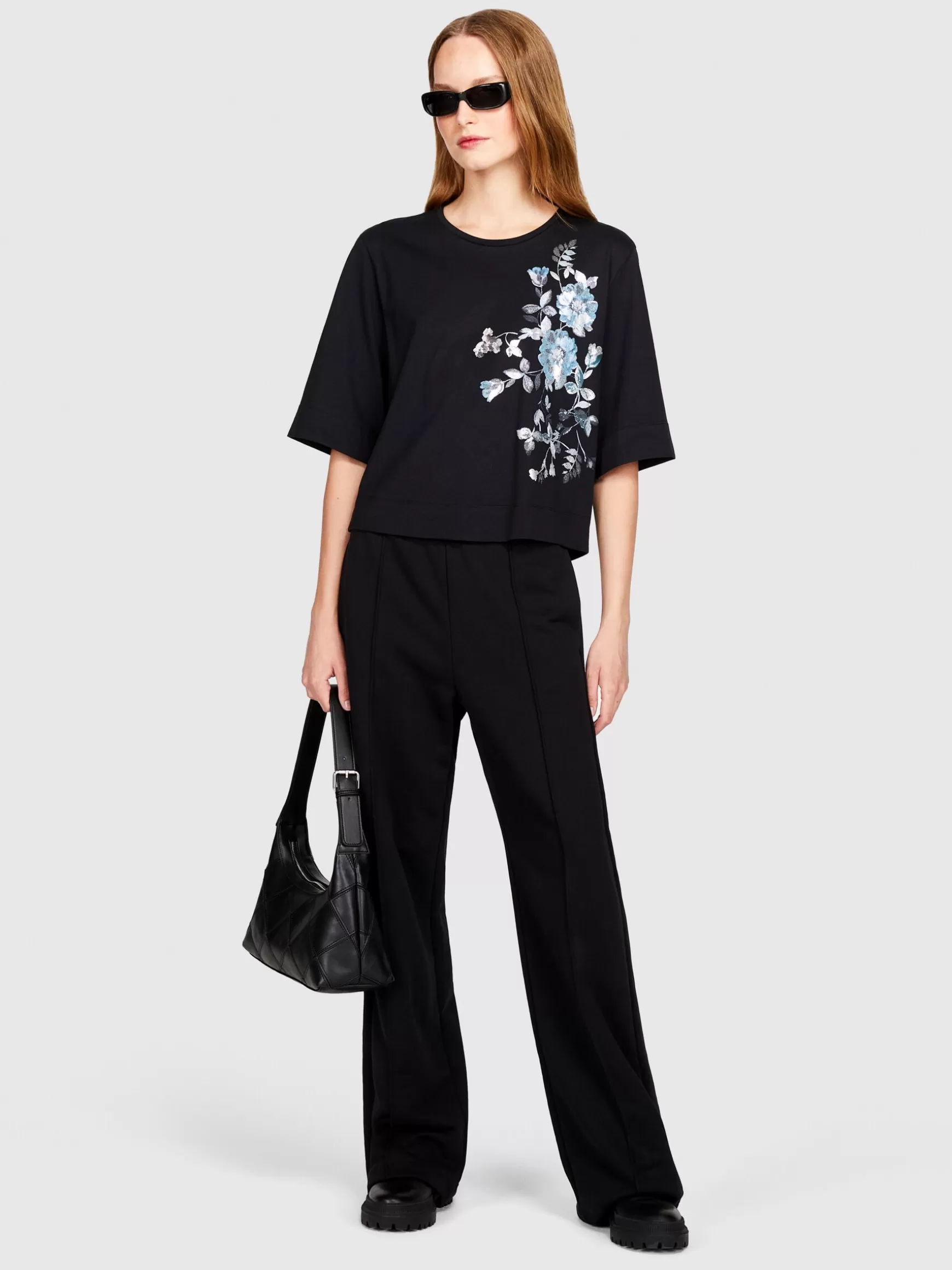 T-Shirt e Top<Sisley T-shirt boxy fit con stampa laminata Nero